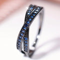 AURELUX Crossed Emerald Sparkle Ring