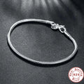 Aurelux — Snake Chain Charm Bracelet