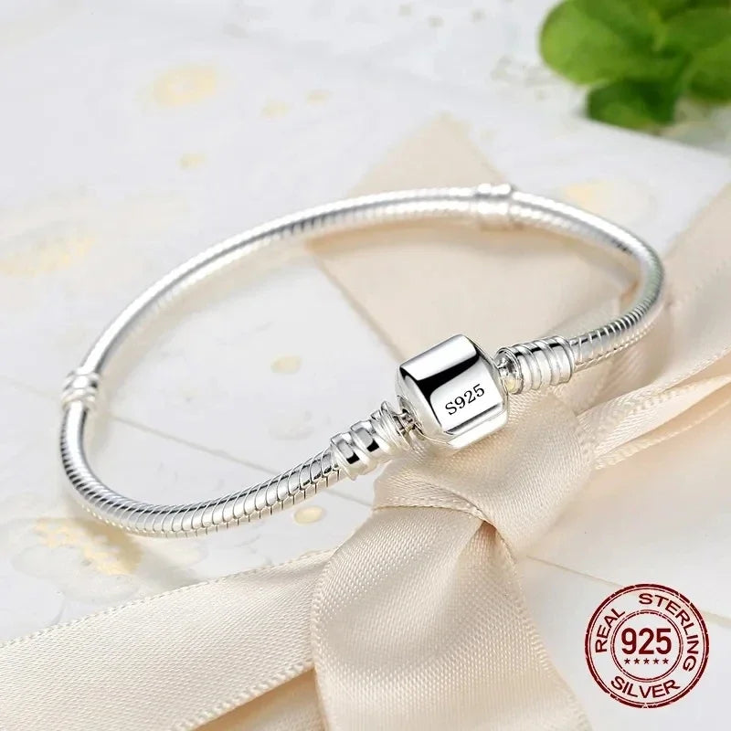 Aurelux — Snake Chain Charm Bracelet