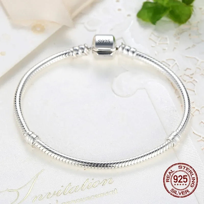 Aurelux — Snake Chain Charm Bracelet