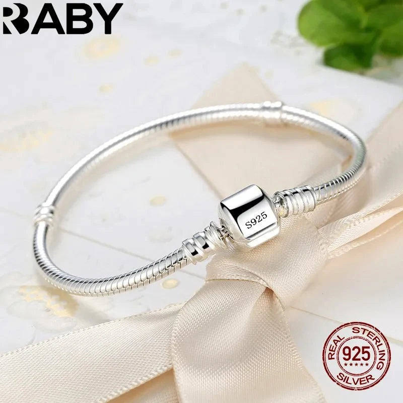 Aurelux — Snake Chain Charm Bracelet
